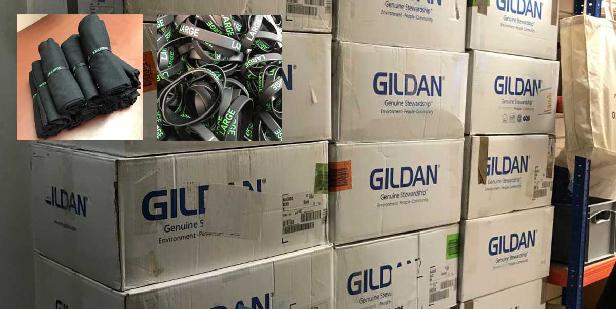 Printed t-shirts folded, rolled and banded