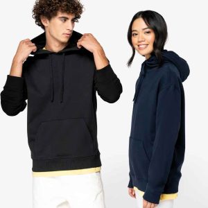 A couple modelling the NS431 Native Spirit Unisex French Terry Hoodie, showcasing eco-conscious workwear.